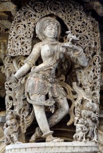 Shukabhashini-lady-talking-to-a-parrot